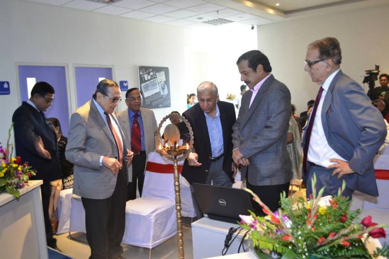 Dr. Santanu Kar lighting the Inaugural lamp with Dr. Piyush Roy (President - Siliguri Obstetrics & Gyencological Society), Dr. K. C. Mitra, Dr. Salil Dutta, Mr. P. L. Mehta and Dr. Baidyanath Chakravarty