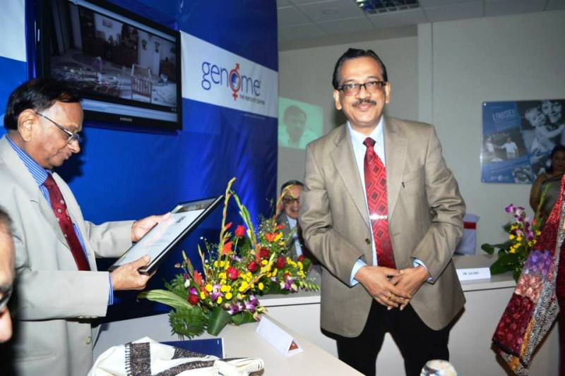 Dr. Salil Dutta being felicitated by his colleague and ardent fan, Dr. Biswajit Dey