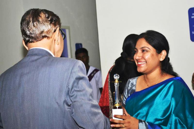 Dr. Shefali Bansal Madhav receiving her memento from the mentor himself-at GENOME - The Fertility Centre, Siliguri